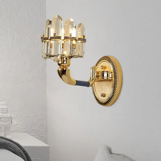 Postmodern blue and gold crystal wall mount lamp with gold finish curved arm and clear crystal accents for bedroom use