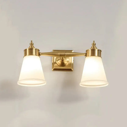 Postmodern brass wall sconce with two frosted cream glass shades for bathroom vanity lighting