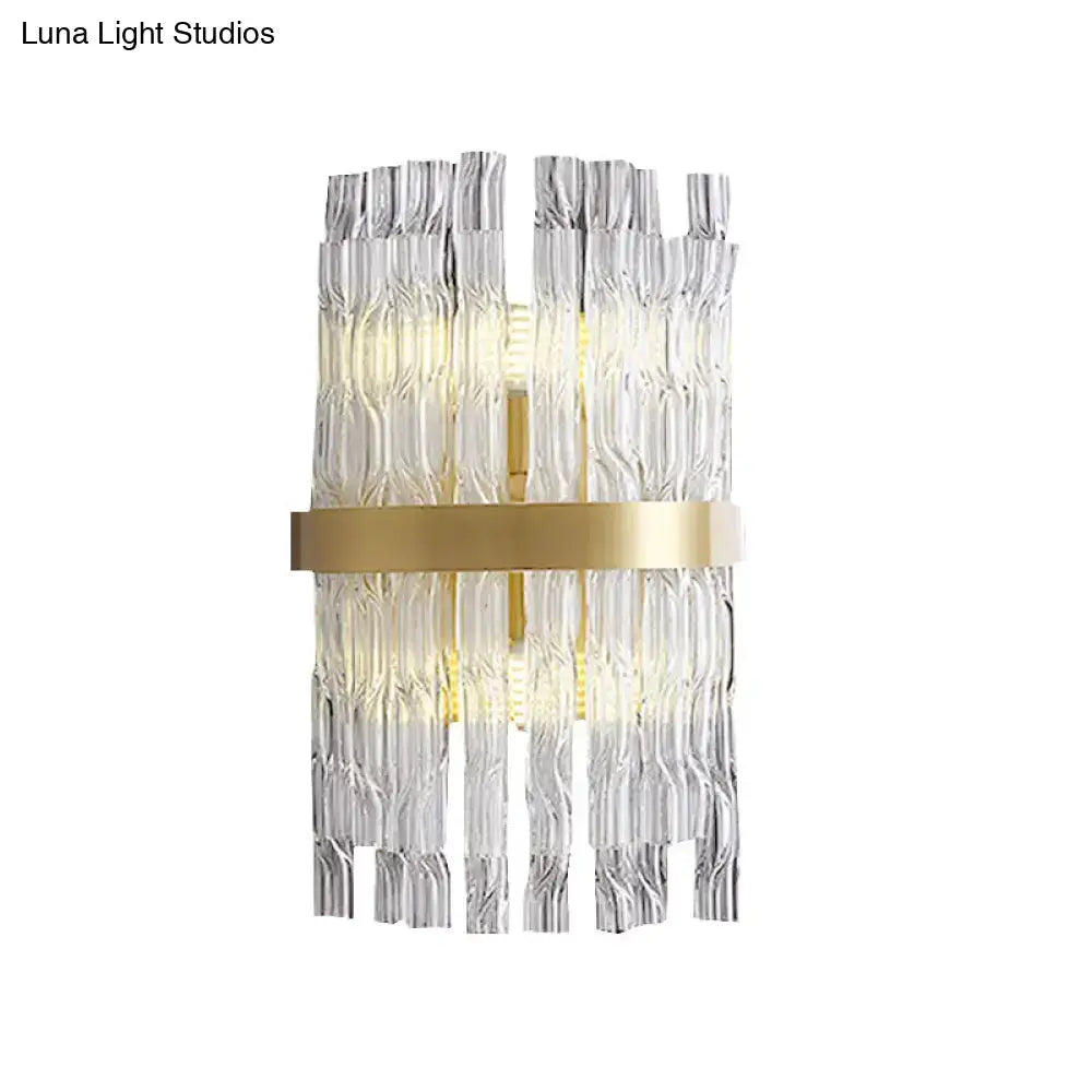 Postmodern crystal rod brass wall light fixture with textured clear glass rods and brushed gold accent for bedroom sconce