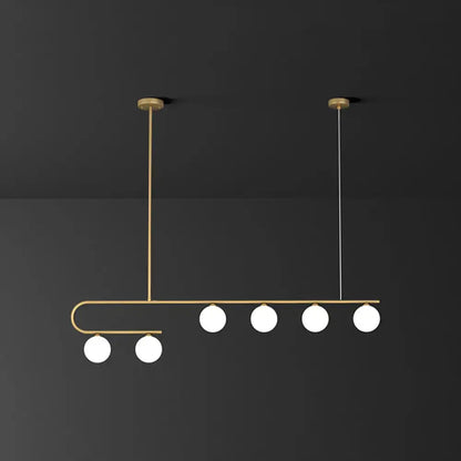 DecorBites postmodern gold linear island pendant light with brass frame and five ivory ball glass bulbs