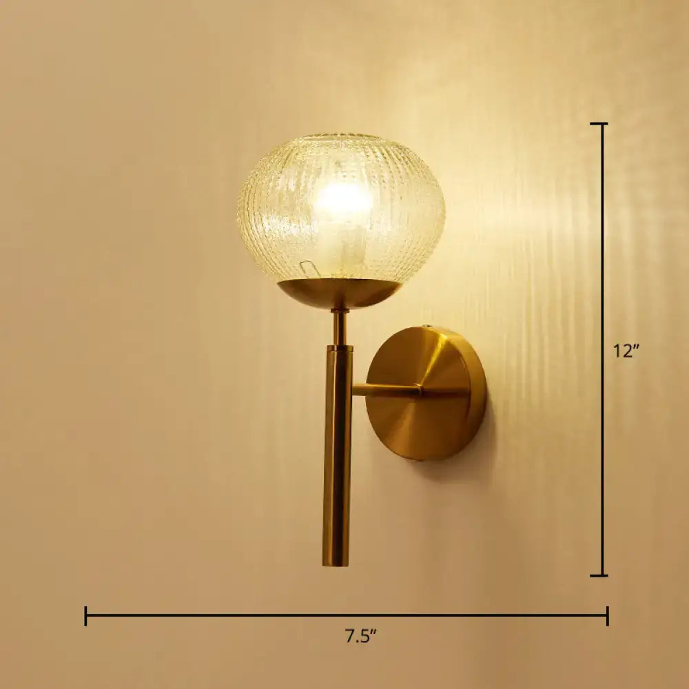 Postmodern gold ball shaped wall sconce with textured glass shade and frosted globe for bedroom lighting