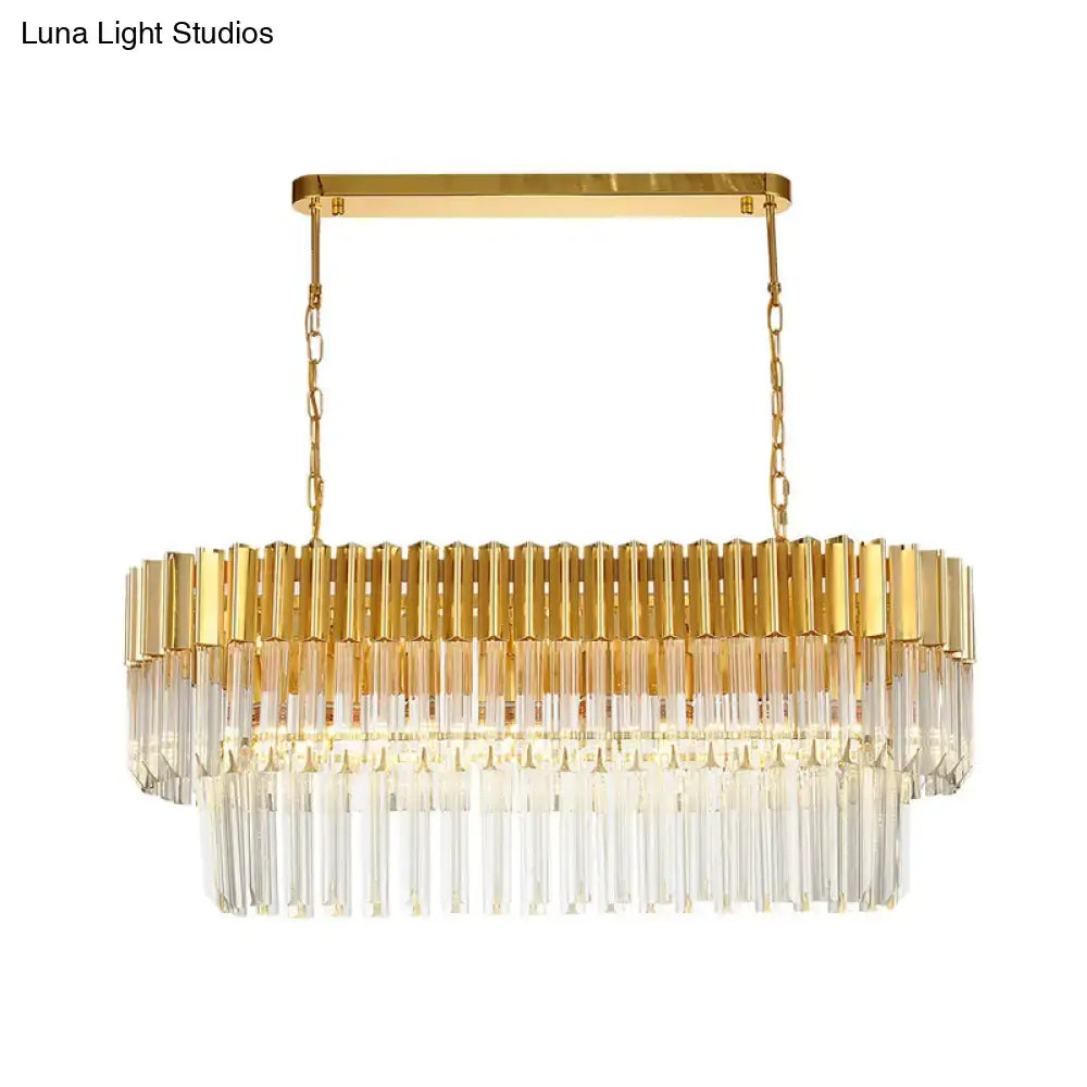 Postmodern gold and clear crystal light fixture with rectangular frame and cascading glass rods for dining room use