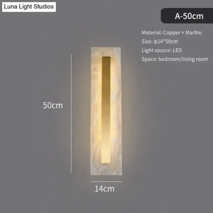 A sleek modern wall lamp with rectangular copper and marble design for living room featuring a copper marble wall style