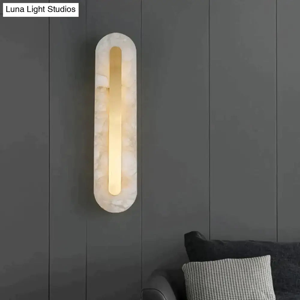 Postmodern oval wall lamp with white marble finish and central gold copper marble wall light strip for living room