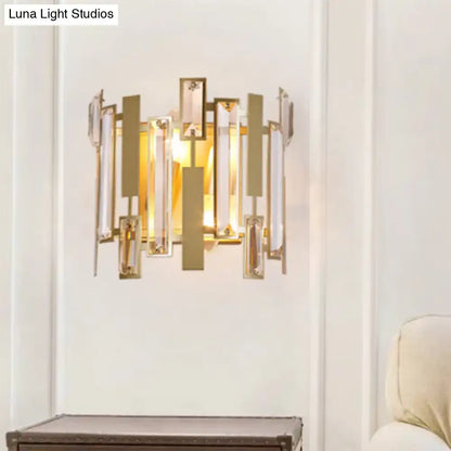Postmodern gold crystal block wall light fixture with clear and frosted glass panels as modern wall light fixture
