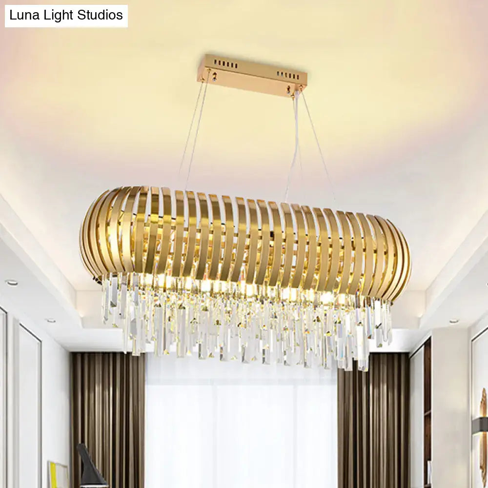 Postmodern gold crystal oval chandelier with sleek ribbed metal frame and clear crystal droplets for dining room island light