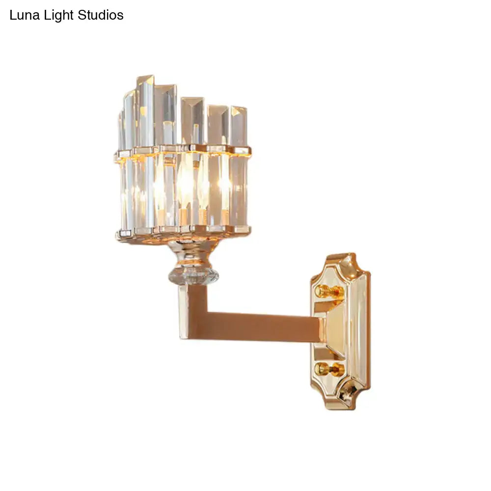 Postmodern gold crystal rod wall light featuring a cluster of clear faceted crystal bars in an upward tiered design wall mounted lamp