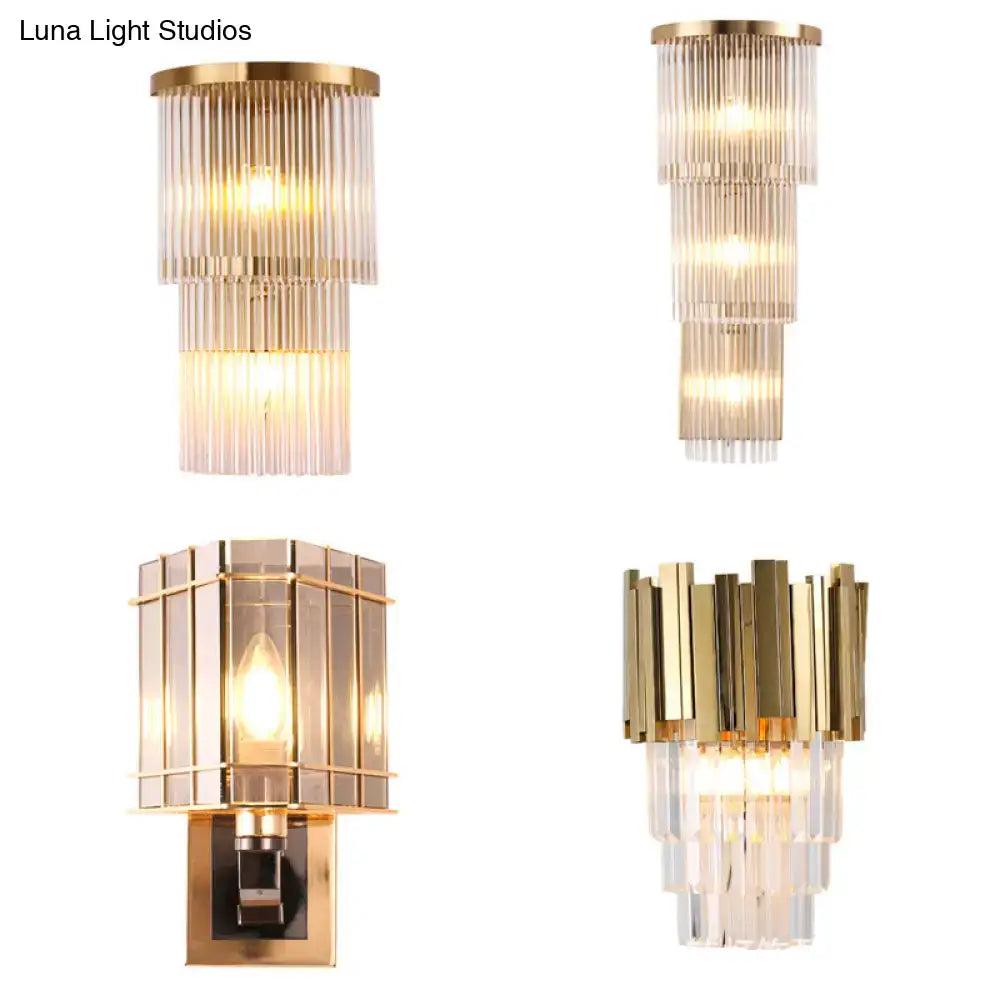 Postmodern gold crystal triangle wall light with cascading glass rods and geometric frame providing warm ambient lighting for living space