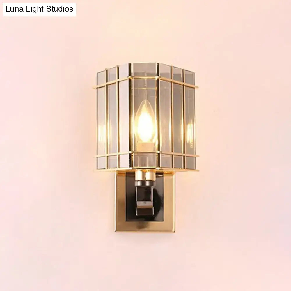 Postmodern gold crystal triangle wall light with a gold-toned geometric glass cage design for chic living space