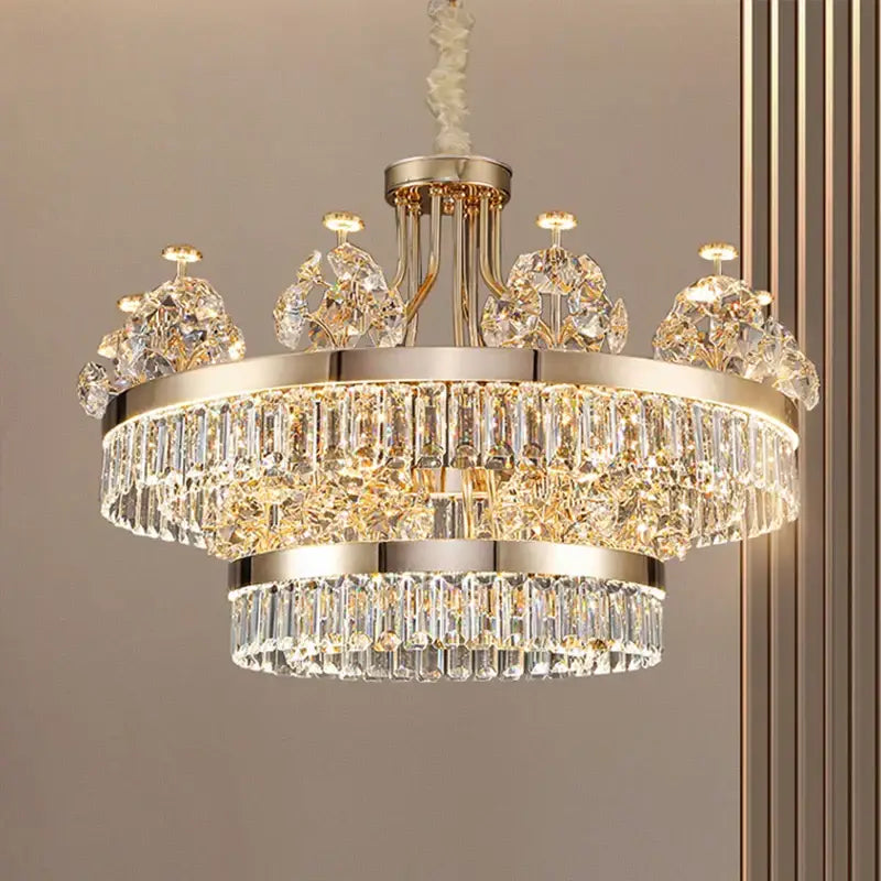 A luxurious postmodern gold decorbites crystal chandelier with double layer design and cascading clear prisms for living room