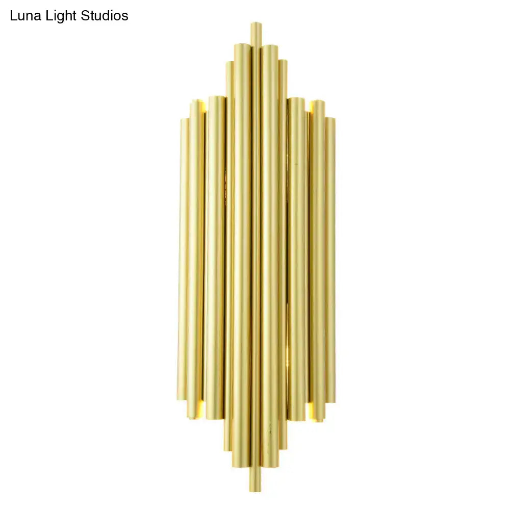 Postmodern gold finish flute wall mount living room sconce with gold-toned cylindrical rod design