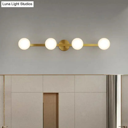 Postmodern gold glass globe wall sconce bathroom fixture with four frosted bulbs and 11in fixture height