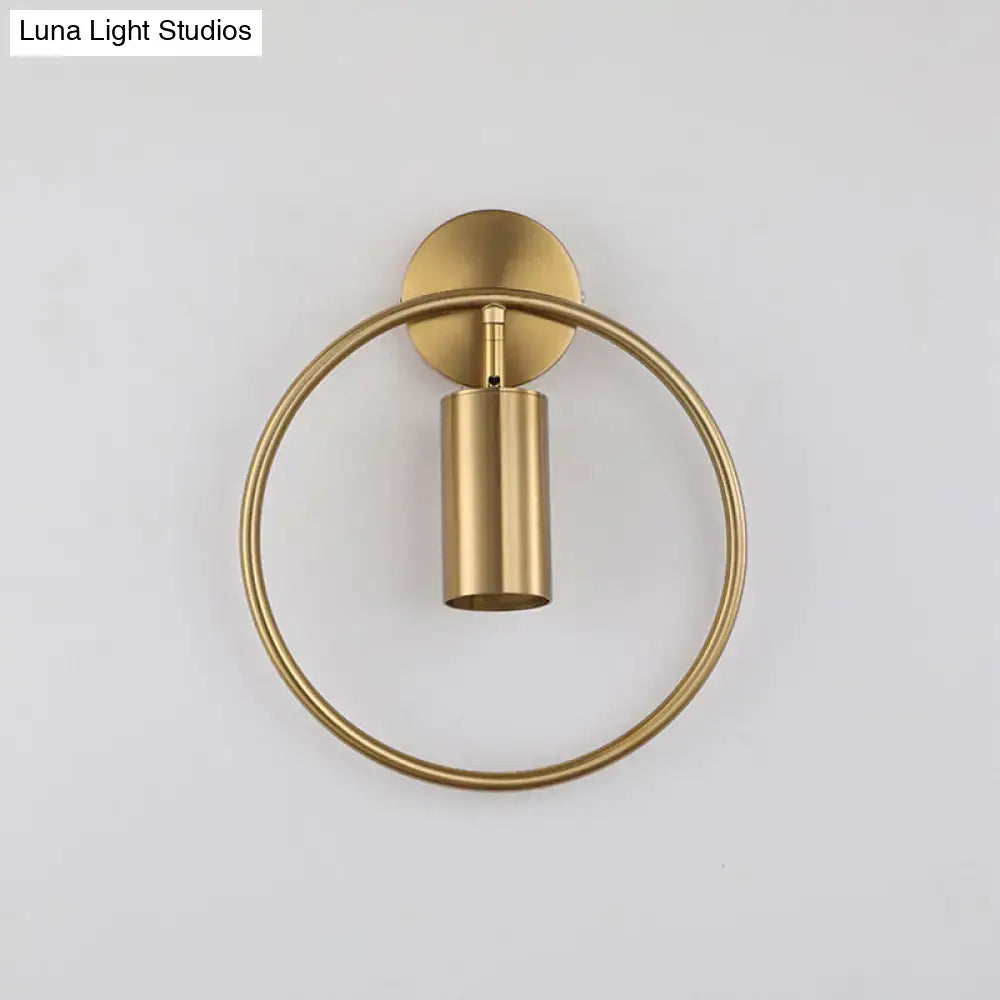 Postmodern gold halo ring wall sconce with brass finish and cylindrical light fixture height 16 inches for bedroom use