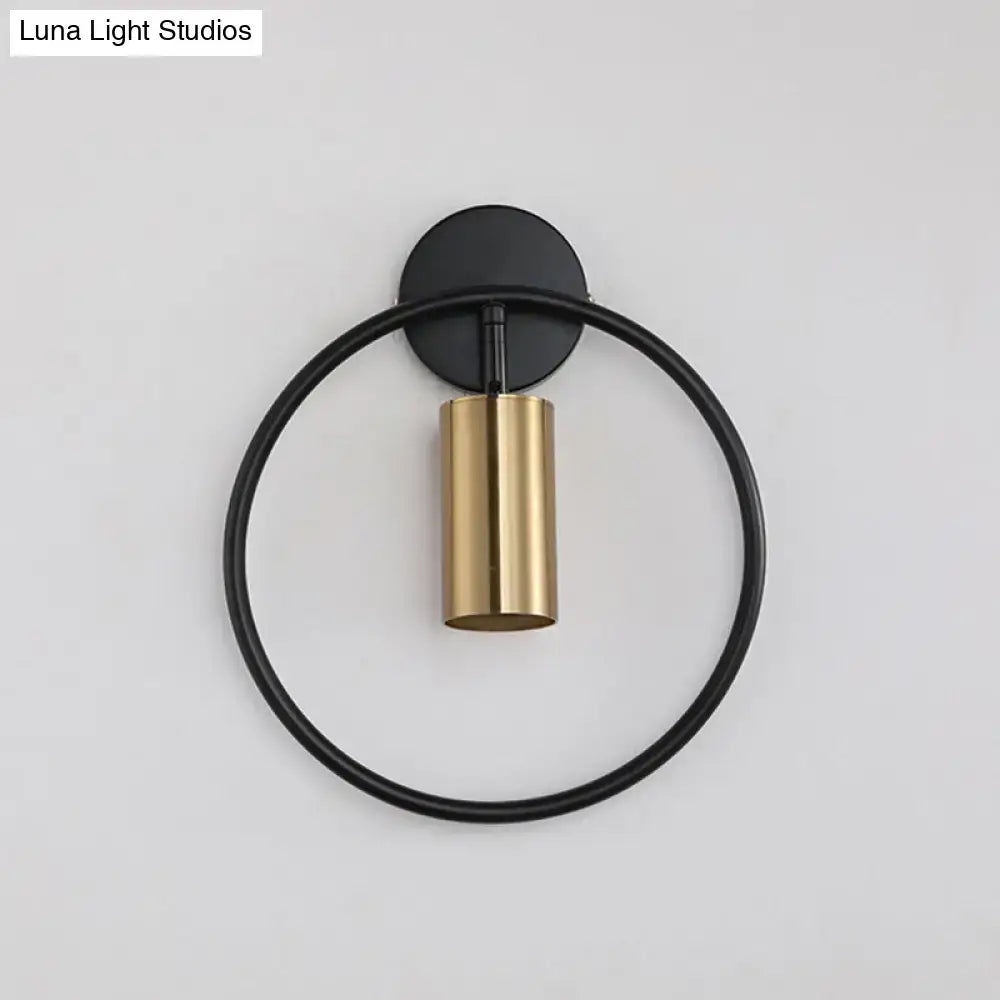 Modern postmodern gold halo ring wall sconce with black circular frame and polished brass light fixture height 16 inches