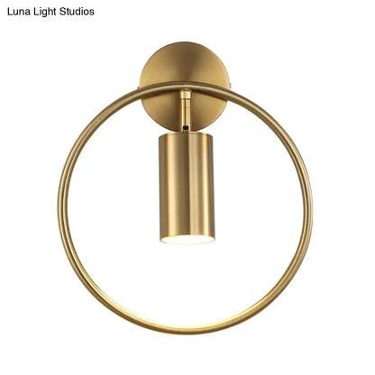 Postmodern gold-toned wall sconce with circular ring and cylindrical light fixture height 16 inches fixture for bedroom