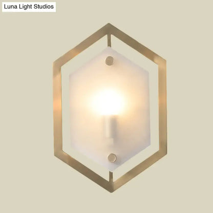 Postmodern gold hexagon wall lamp with a brass frame and frosted glass shade sconce lighting for bedroom use
