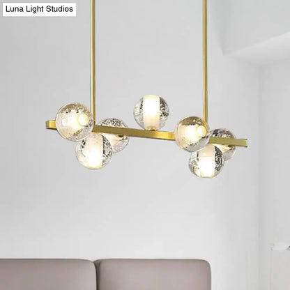 Gold-toned DecorBites™ postmodern seeded crystal suspension chandelier with 6 crackled glass globes ideal for dining rooms