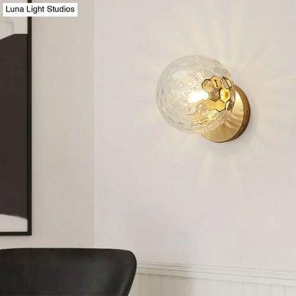 Postmodern gold ball wall sconce with textured clear glass honeycomb globe for stairway wall lighting