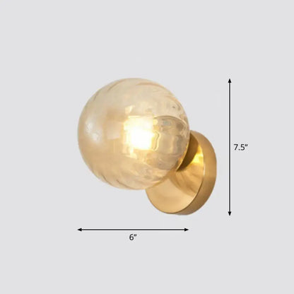 Postmodern gold ball wall sconce with textured frosted glass globe designed for stairway wall lighting
