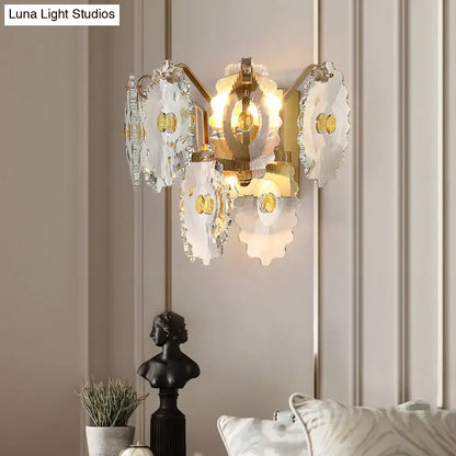 Elegant green gold gem crystal wall sconce with scalloped glass panels and gold accents for bedroom lighting