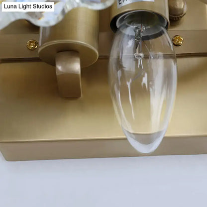 Postmodern green gold gem crystal wall sconce with gold finish clear teardrop glass bulb and crystal accents for bedroom light