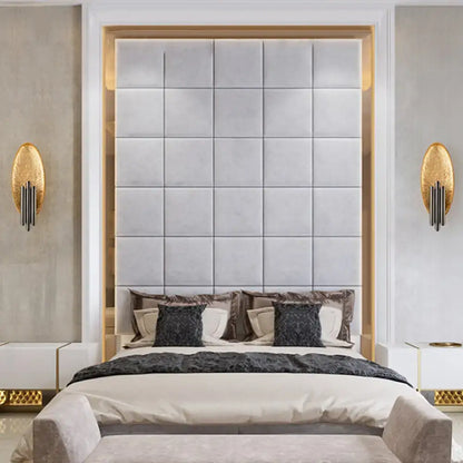 The bed with a tufted light gray upholstered headboard is paired with matching nightstands and a postmodern led oblong wall lamp feature for bedroom 110v-120v