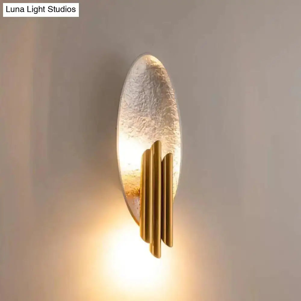 Gold-toned postmodern led oblong wall lamp feature with textured oval glass panel and vertical brass rods for 110v-120v use
