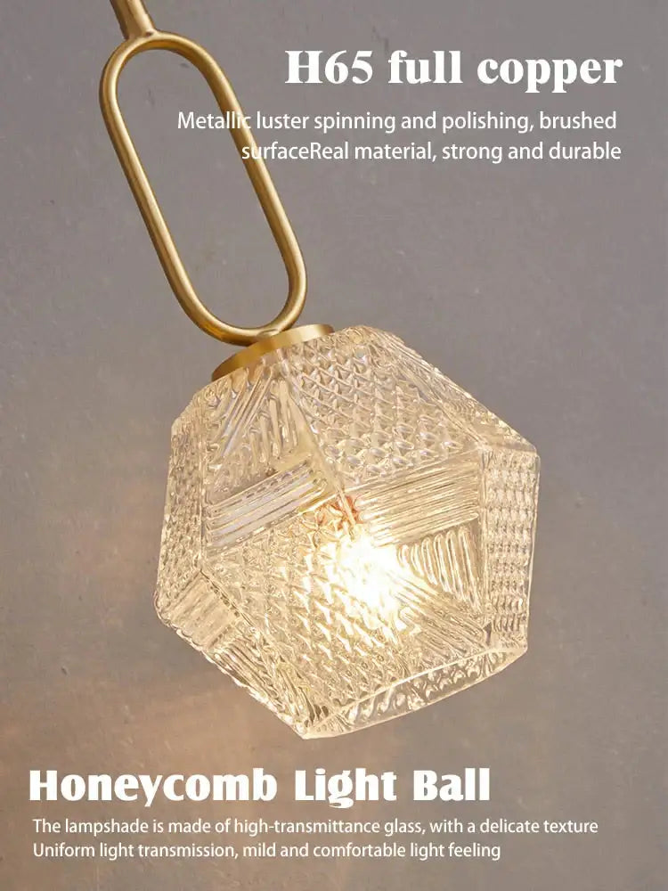 Postmodern luxury led wall lamp with hexagonal honeycomb glass lampshade and brushed brass copper chain in gold crystal design