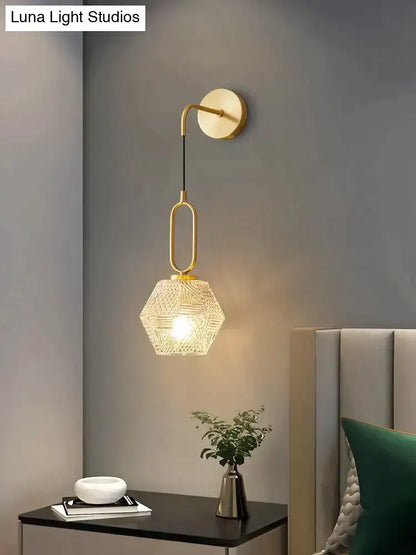 Gold-toned postmodern luxury led wall lamp with geometric woven glass shade ideal for bedroom lighting