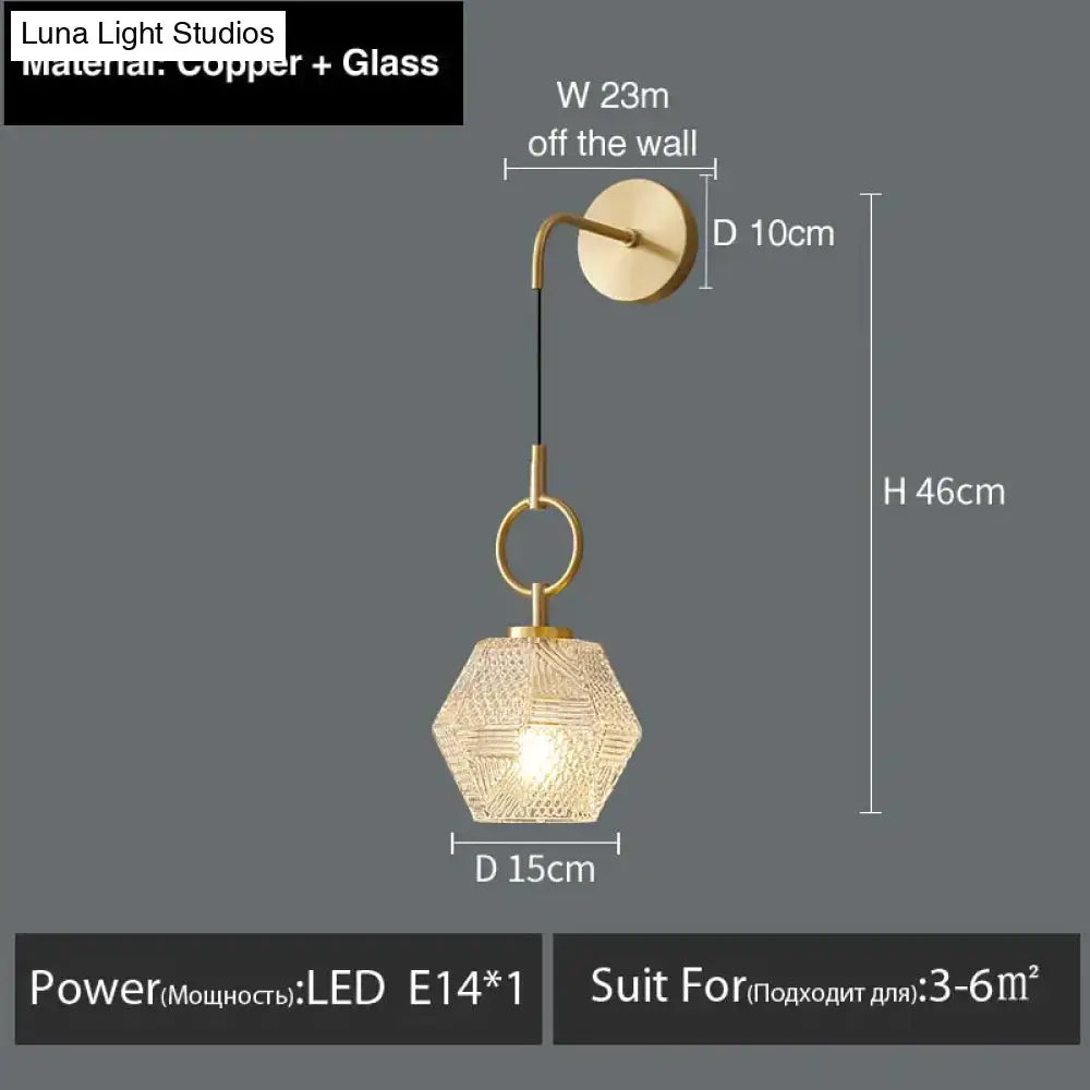 A postmodern luxury led wall lamp with a brass-finished copper and glass hexagonal shade featuring a woven pattern