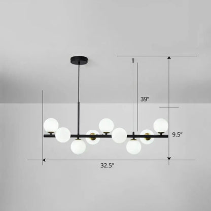 Modern black metal chandelier with frosted white glass globes for dining room featuring smoke grey cognac accents