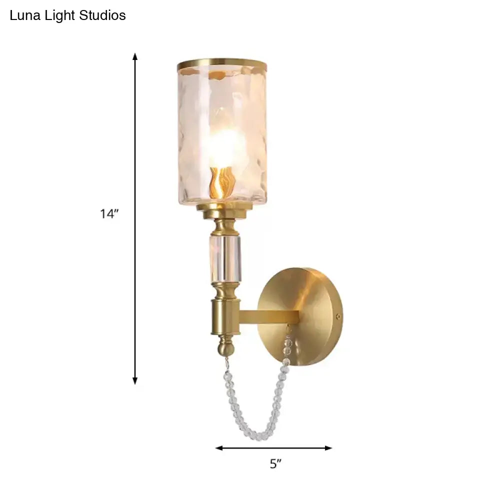 Postmodern water glass brass wall light with gold finish textured glass shade and crystal bead chain for bedroom sconce