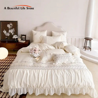 Cream-colored princess wedding bedding set with decorbites flowers embroidery and soft flowing fabric finish