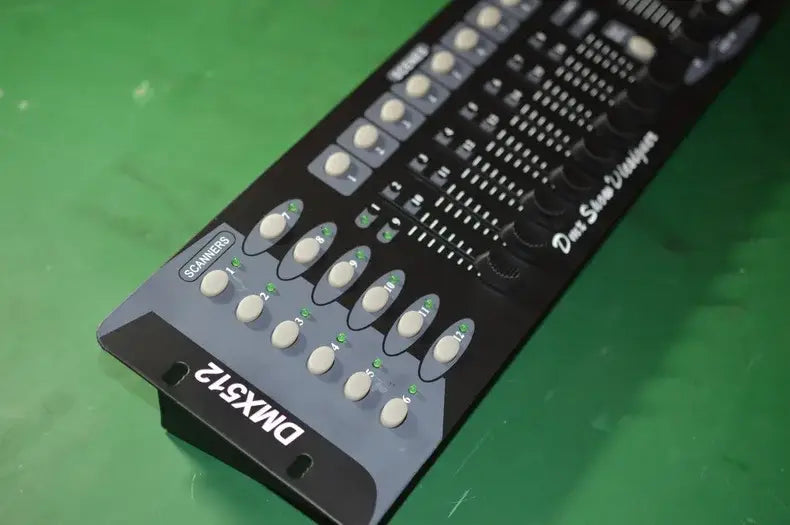 Professional black dmx controller stage with white knobs and illuminated green indicators for event room use