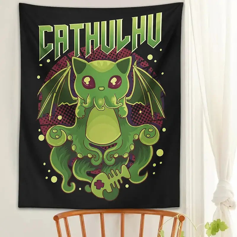 Black tapestry wall hanging featuring a green cartoonish cthulhu with bat wings and glowing yellow accents for decorbites cat decor