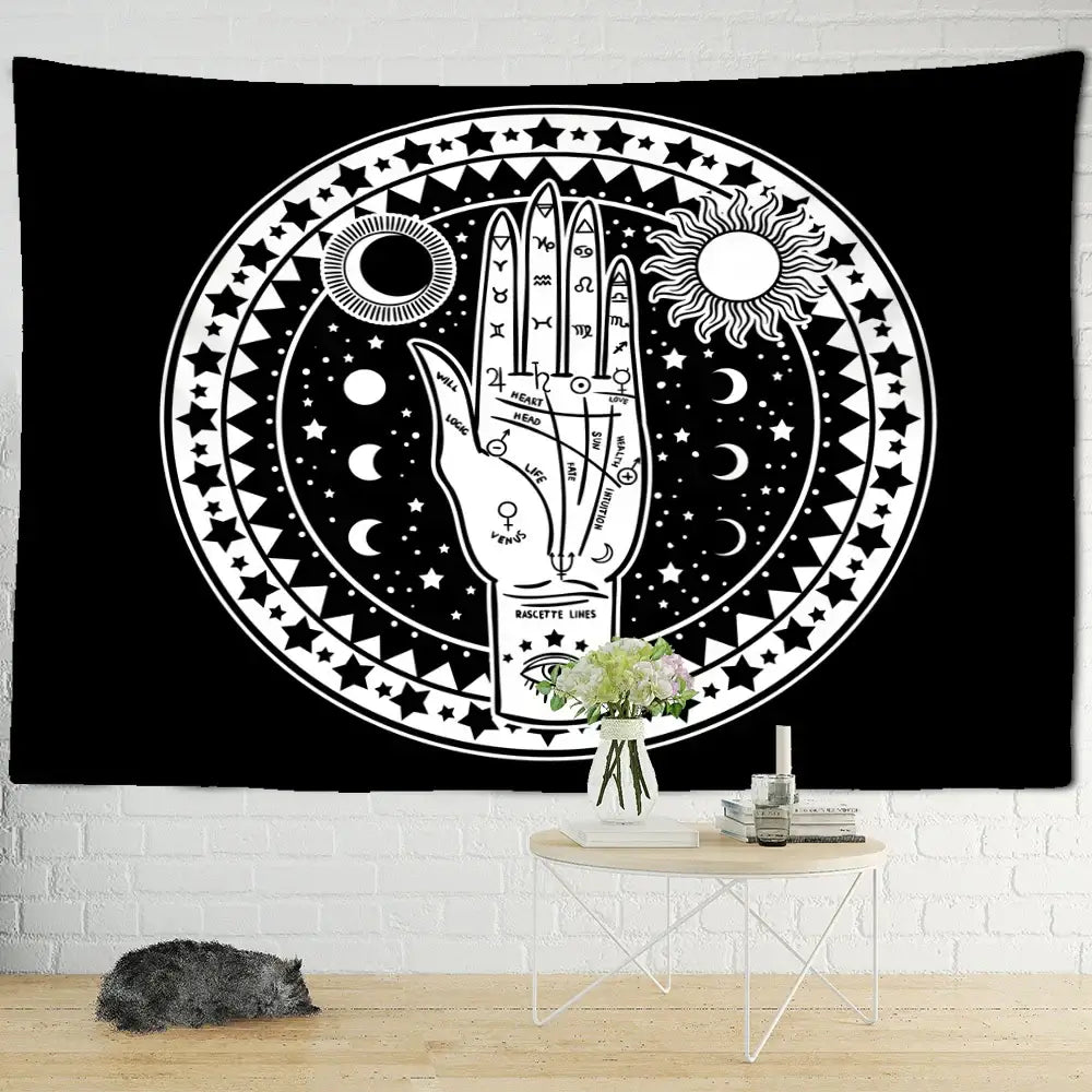 Psychedelic black cat wall hanging featuring a black tapestry with white celestial design and illustrated hand decorbites black cat