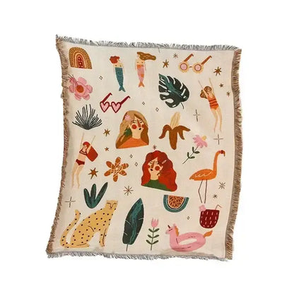 Beige throw blanket with colorful tropical animal and plant patterns on textured weave ethnic tapestry sofa blanket