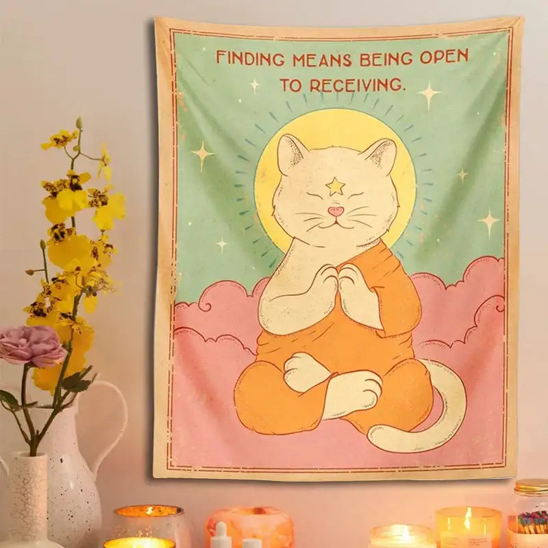 A decorbites cat tapestry featuring an orange meditative cat with a yellow halo on mint green and pink clouds background