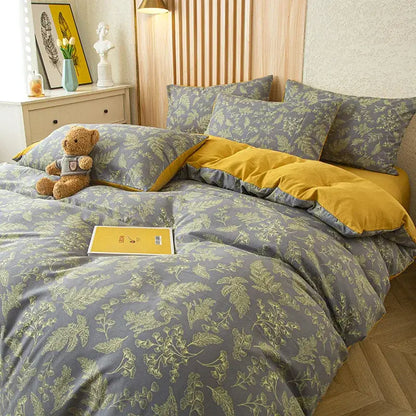 Gray and mustard-yellow floral duvet bedding set with soft textured fabric and subtle green leaf print for bedroom decor