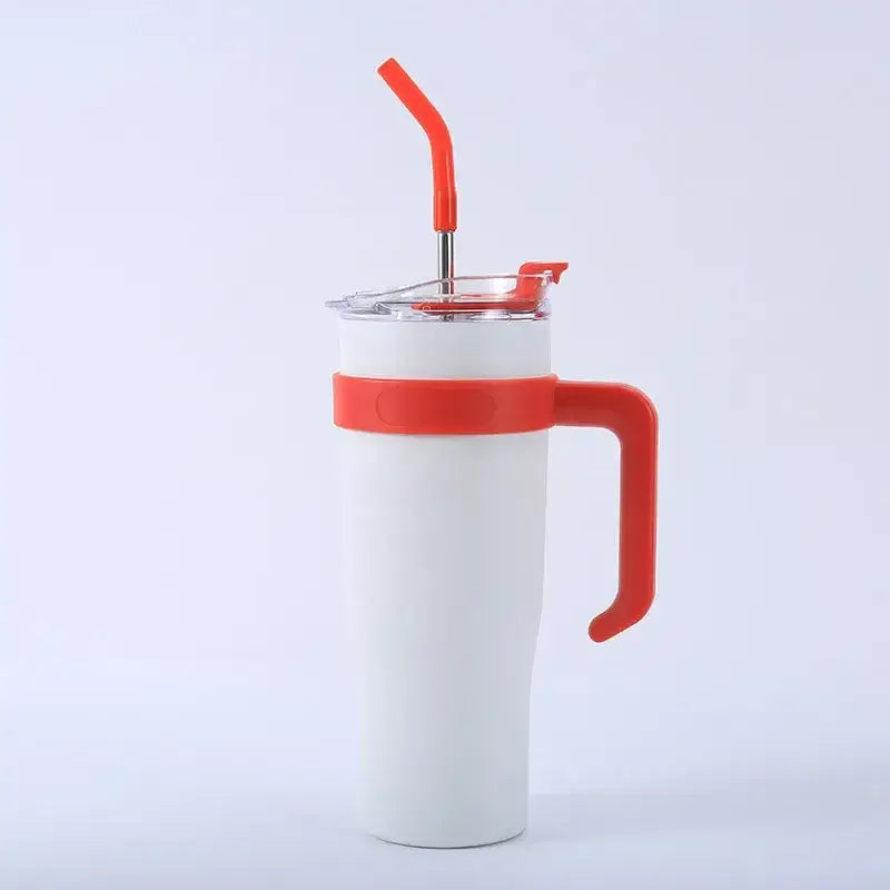 White insulated stainless steel sippy cup with red silicone handle and lid featuring orange bendy straw for travel use