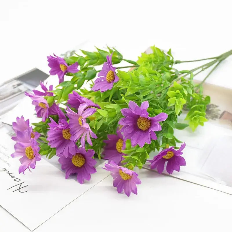 A bouquet green plant of artificial purple cosmos flowers with yellow centers for living room decor synthetic flowers