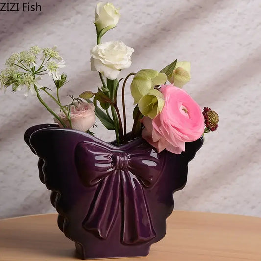 Purple glossy dark butterfly ceramic bow vase with glossy finish for living room decor by decorbites dark butterfly