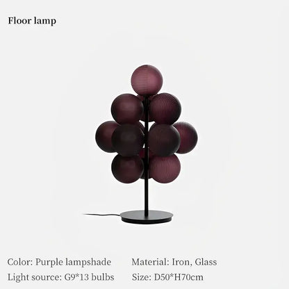 Purple glass globe floor lamp with black iron stand featured in decorbites grape chandelier modern living room light