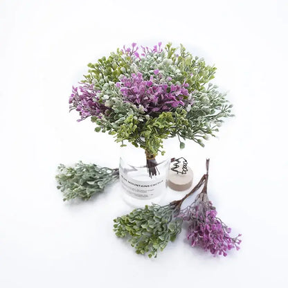 A decorbites artificial flower vase featuring a delicate purple and green foliage bouquet in clear glass with mountains cactus print