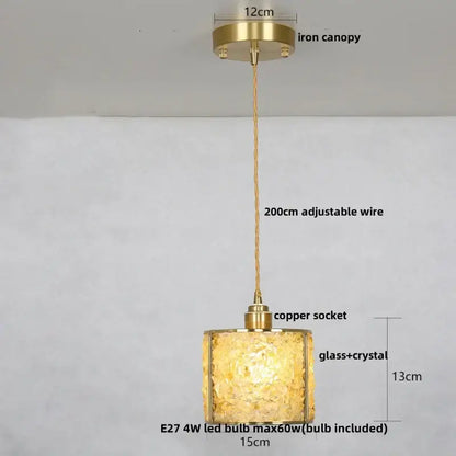 A warm golden-hued decorbites crystal glass led pendant light with textured shade for living room decor