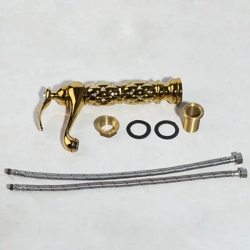 Quilted diamond decorbites golden plated bathroom basin faucet in gold with diamond embellishments and polished finish