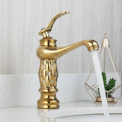 Golden plated bathroom basin faucet with quilted diamond decorbites body and elegant curved spout in gold color