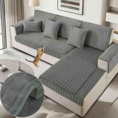 Quilted gray plush sofa cover with soft texture and subtle ribbed stitching for non slip living room use