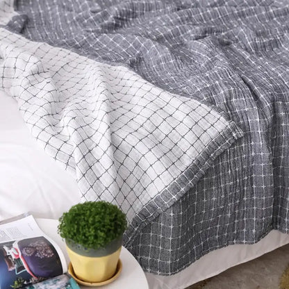 Gray and white checkered quilted grid cotton gauze sofa cover with a soft textured weave for living room decorbites cotton gauze