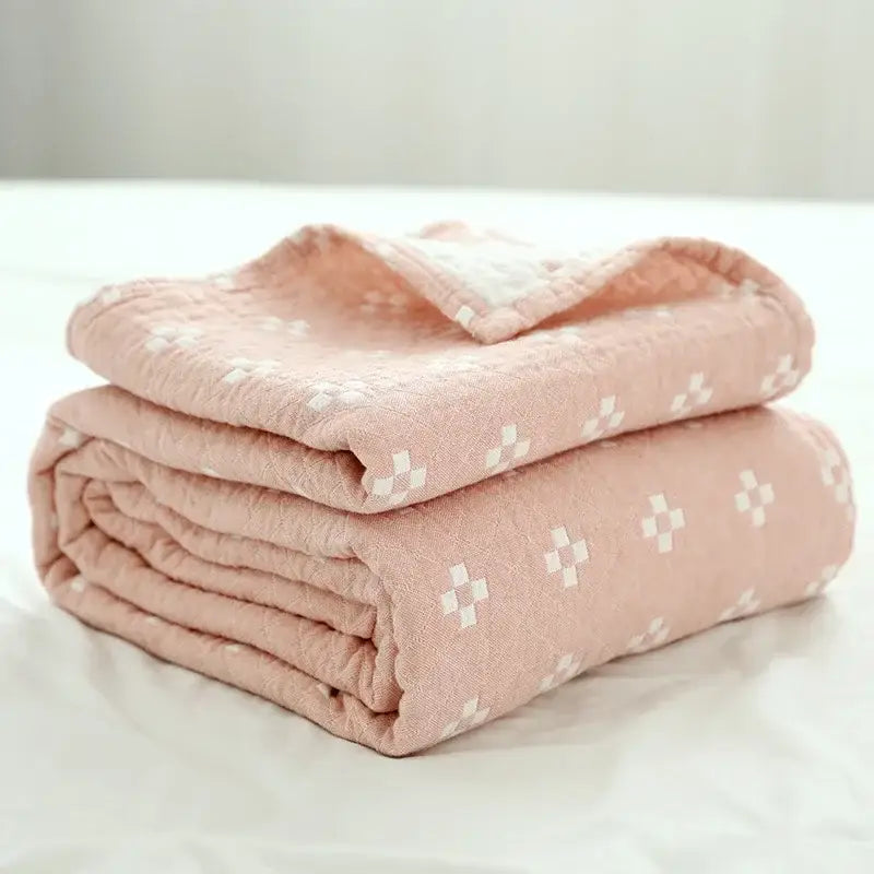 Soft pink quilted grid cotton gauze sofa cover with subtle white crosshatch pattern for living room decorbites cotton gauze